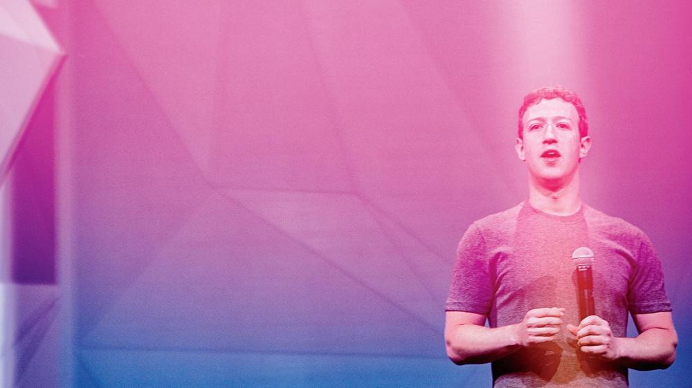 A stylized photograph of Mark Zuckerberg holding a microphone and speaking.
