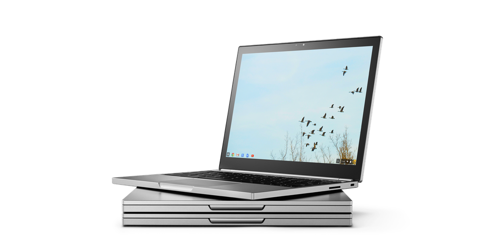 An image of three Chromebook Pixels stacked on top of one another, with the top one’s lid opened to the chromeOS desktop.